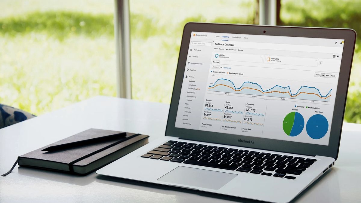 A laptop showing a website analytics dashboard