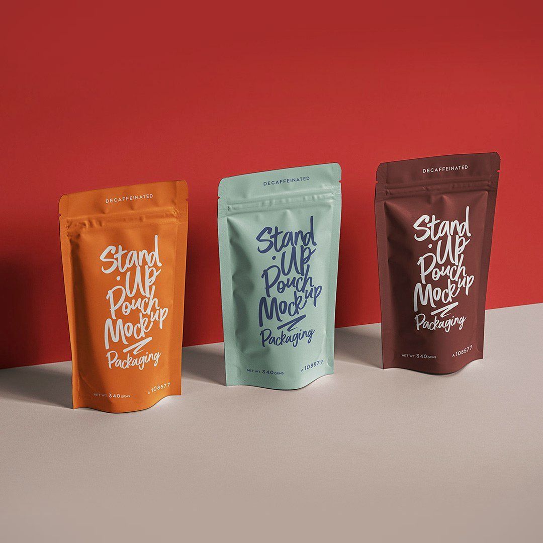 Three branded stand-up pouch packaging mockups