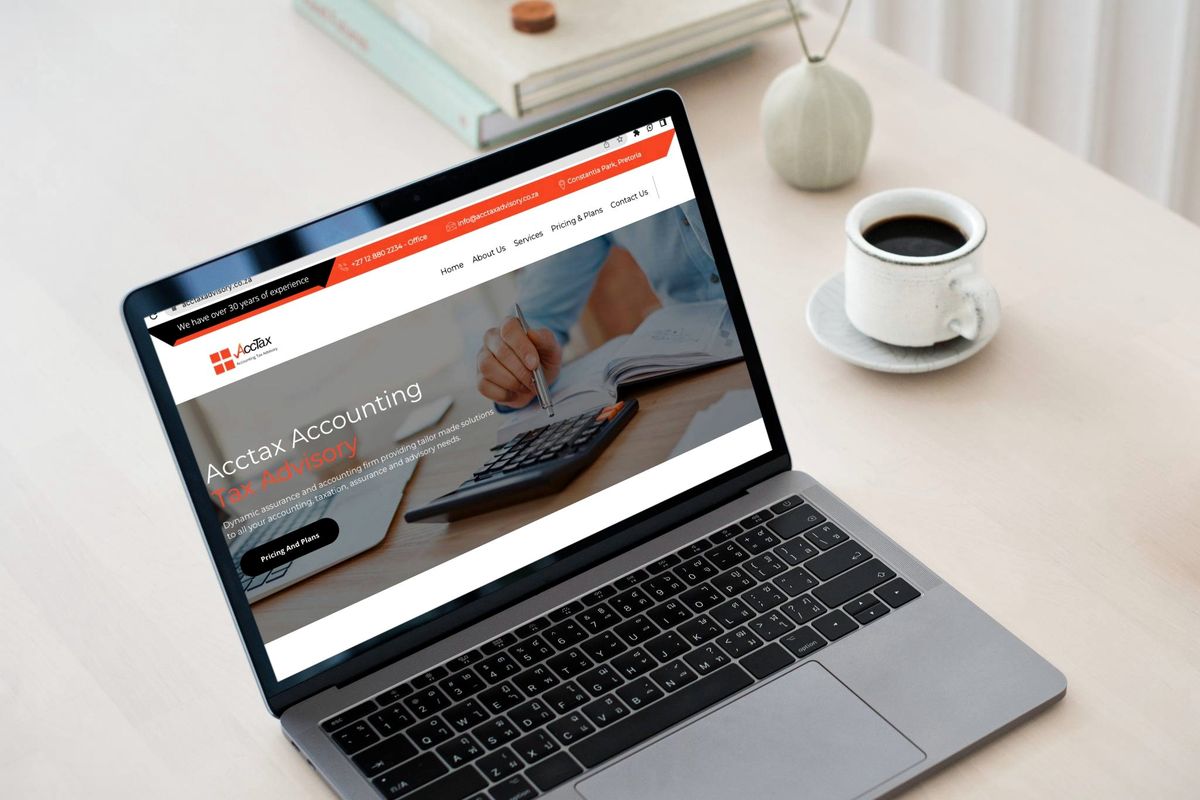 Acctax Accounting website shown on a laptop