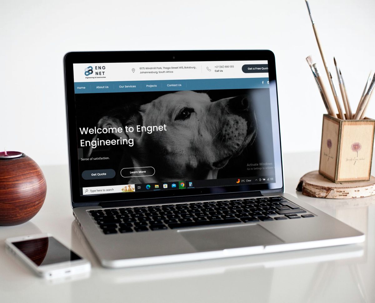 Engnet Engineering & Construction website shown on a laptop