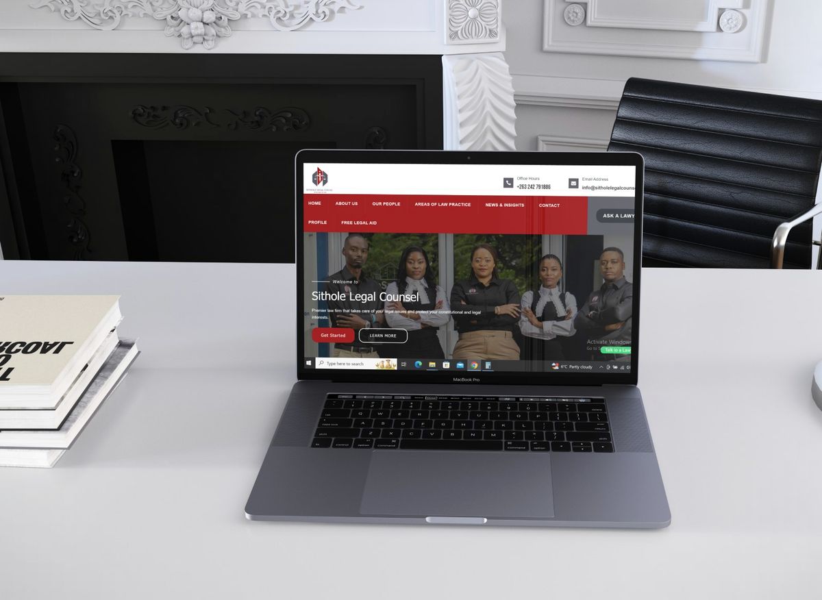 Sithole Legal Counsel website shown on a laptop